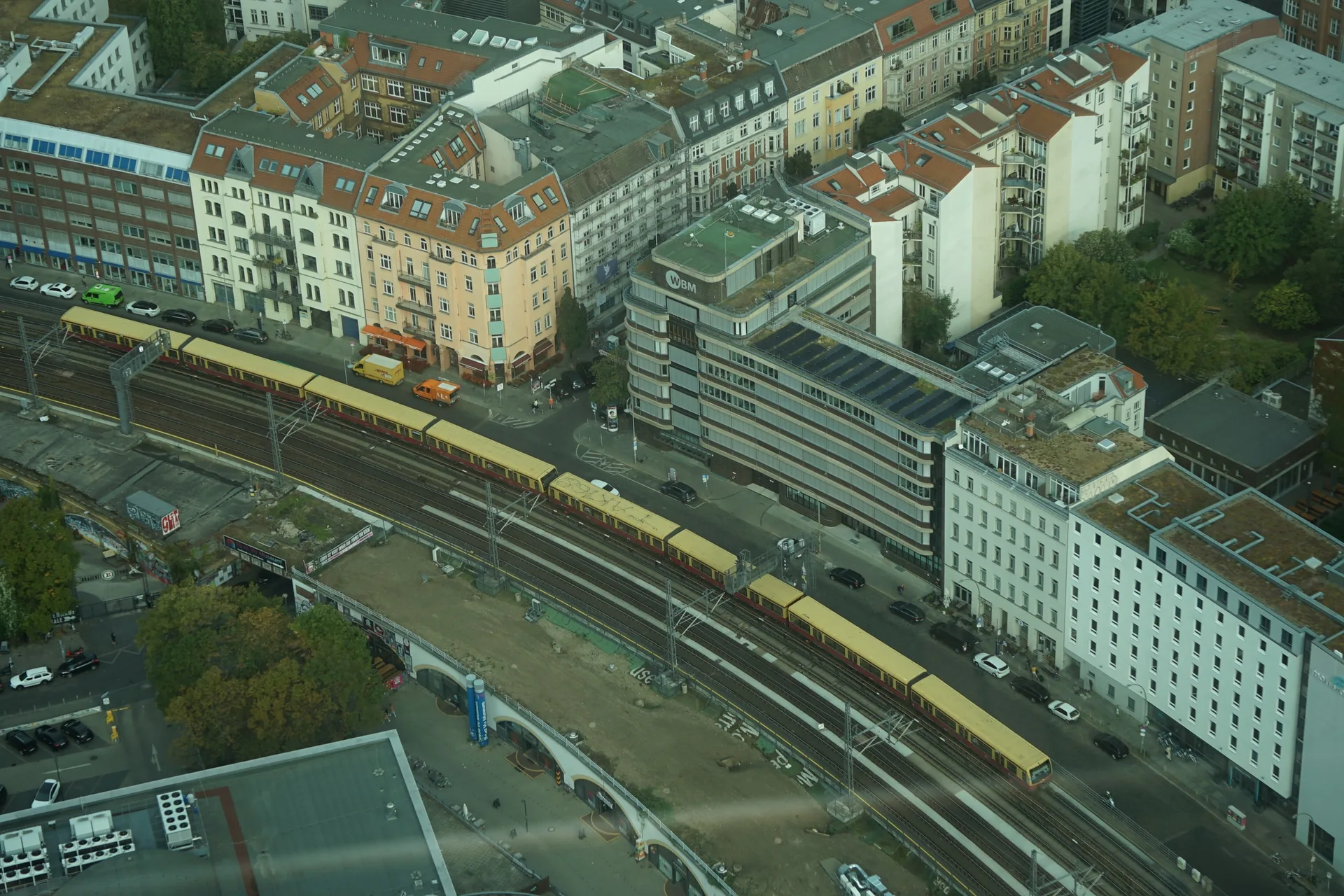 The S-Bahn curving between the tenements of Mitte, seen from the Berlin television tower.